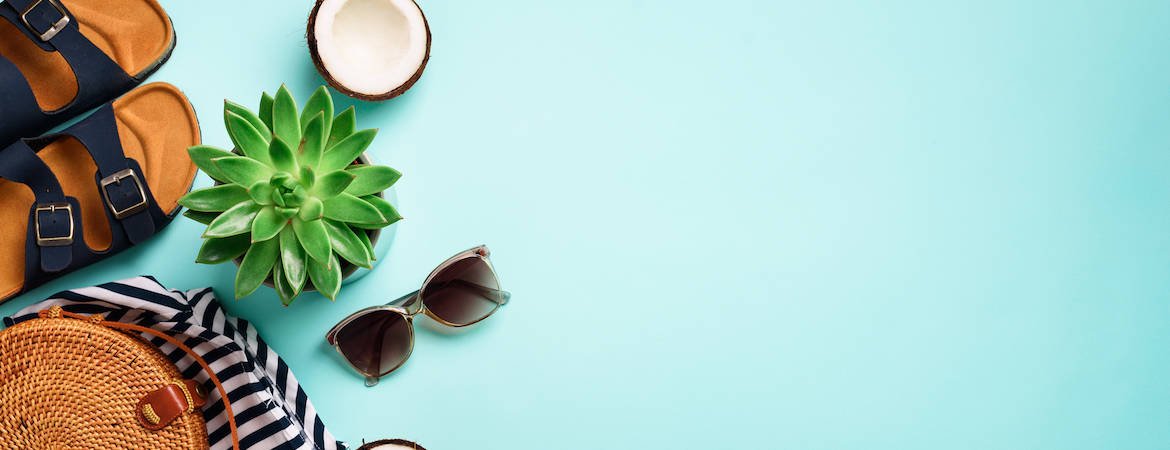 A picture of sun glasses and half coconut